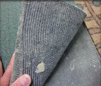 Flooring Failure - Rubber-Backed Carpet