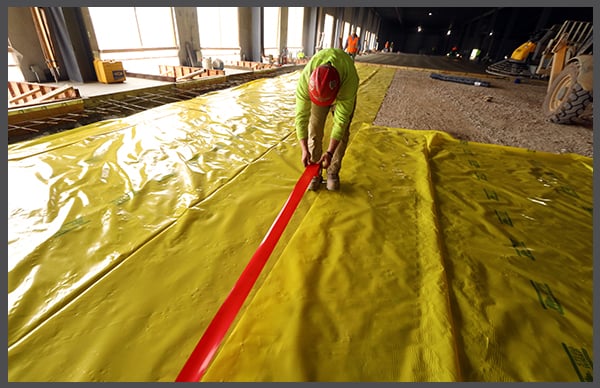 High-Performance-Floor-In-Warehouse-Uses-Stego-Wrap-and-Stego-Tape