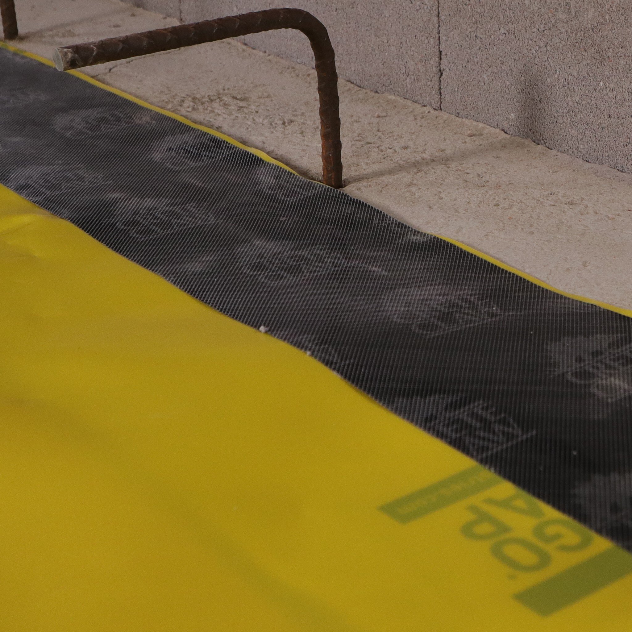 Stego-Crete-Claw-Tape-6in-Adjacent-to-Footing-with-Horz-Rebar-2048x2048