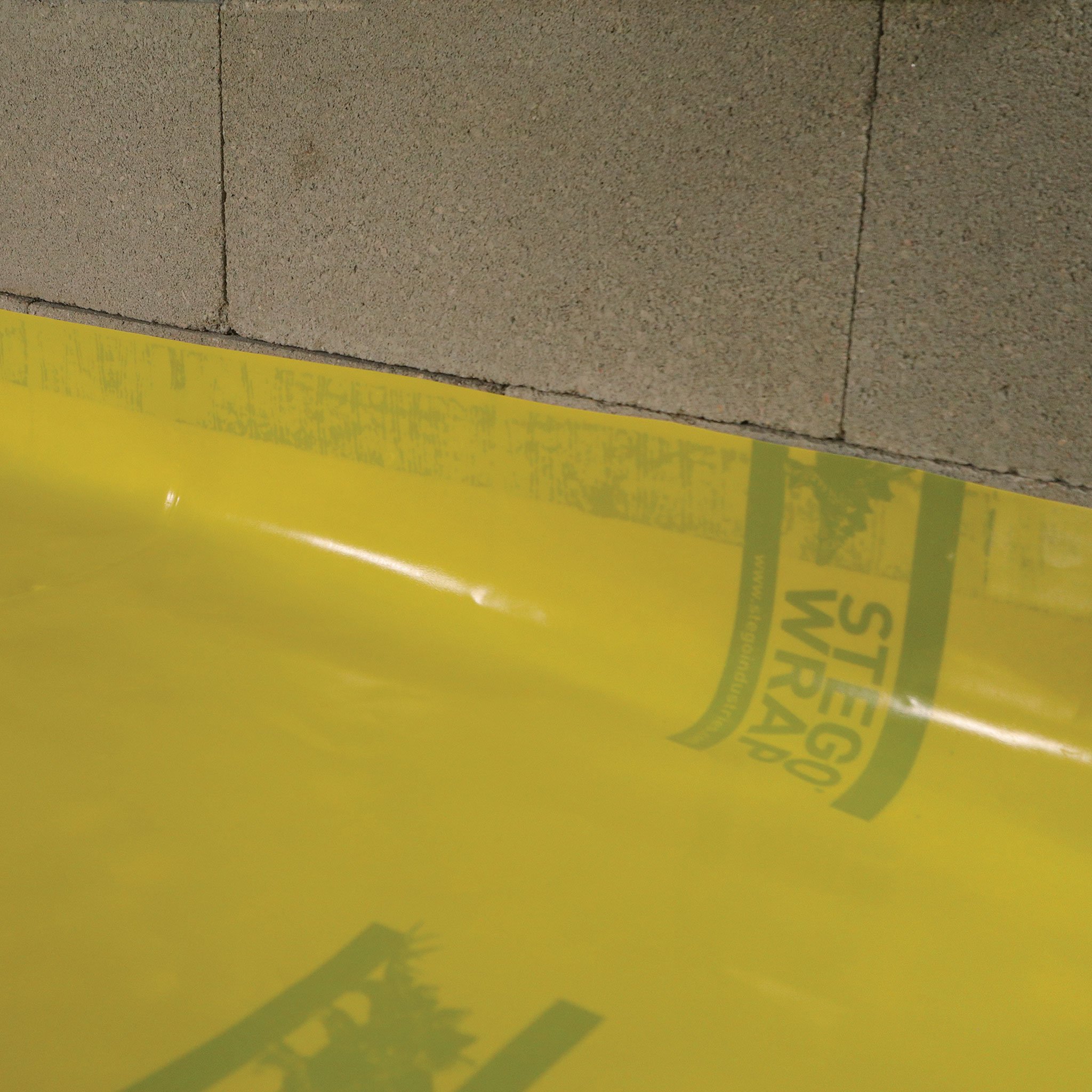Stego-Wrap-Seal-Vertical-StegoTack-Tape-3-2048x2048