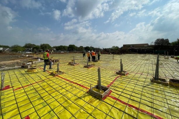 stego wrap jobsite with workers